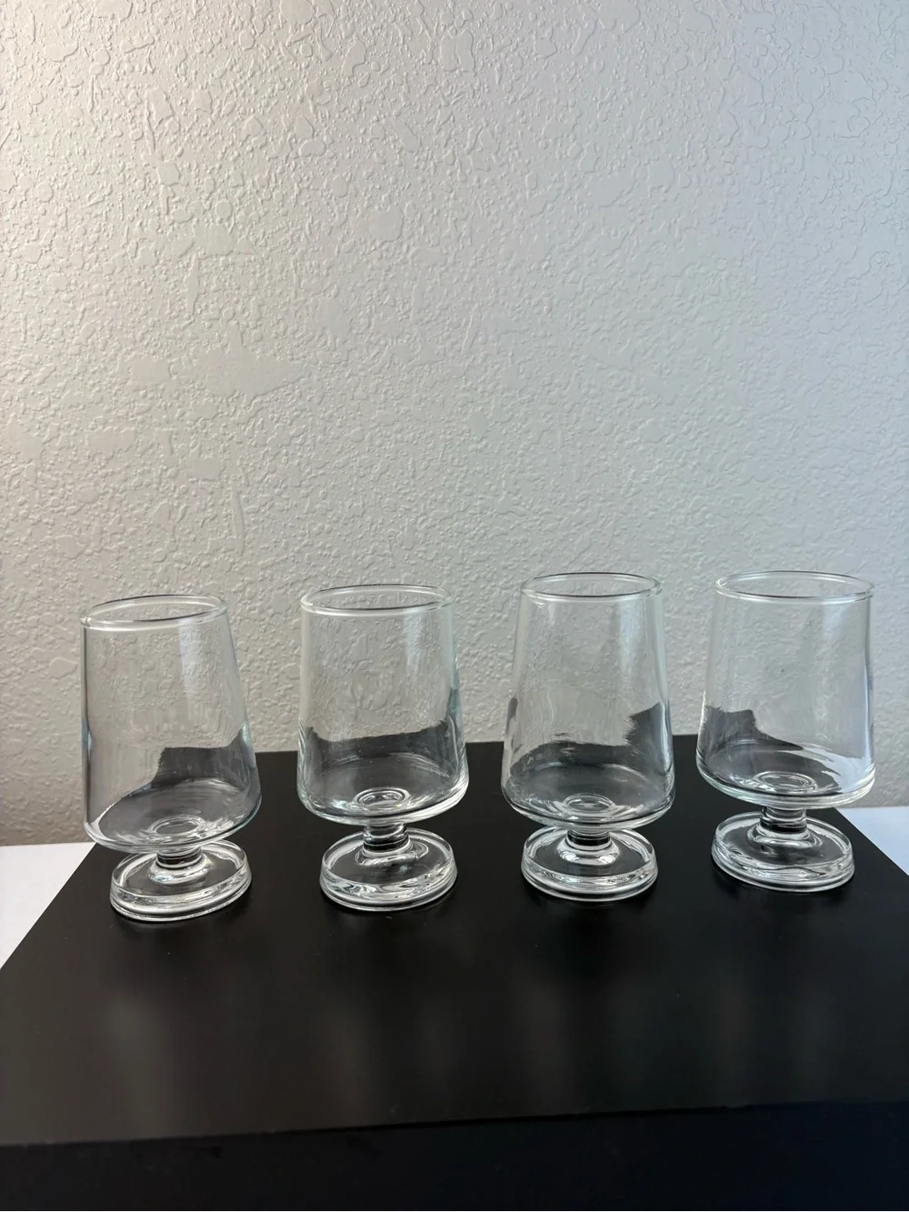 Clear Glass Stemmed Tumblers, Commonly Styled as Brandy Goblet Glasses.